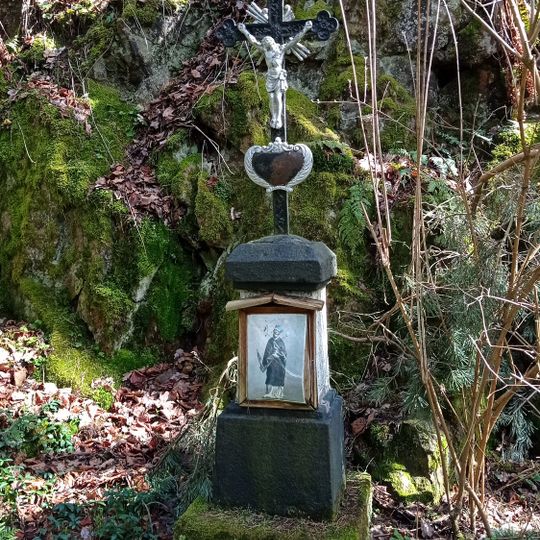 Wayside cross under the bridge at Malče