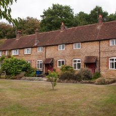 Home Farm Cottages With Stables To Left And Buildings To East
