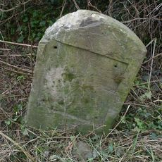 Milestone, hald mile W of village