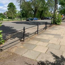 Footway And Iron Railings Stretching From The Short Street Corner Outside Number 2 To Number 70