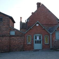 Outbuilding And Attached Brick Wall In Courtyard To Rear Of Sweeney Hall
