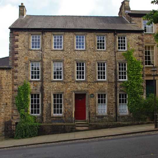 Number 24 with attached forecourt wall