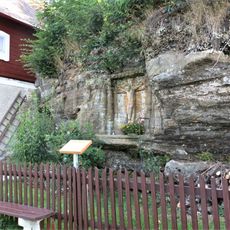 Skalní reliéf Krista na Kalvárii u domu 105 v Radvanci