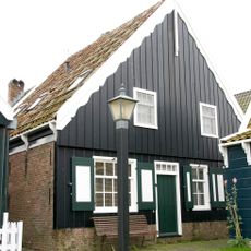 Perceelsgedeelte van een houten huis