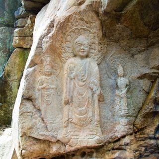 Rock-carved triad buddha in Seosan