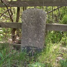 Milestone, Tedburn Road, parallel with new A30 near to sign post, 500m W of Wheatley Cottage