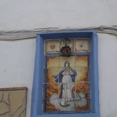Ceramic panel of the Immaculate at 35 Larga street