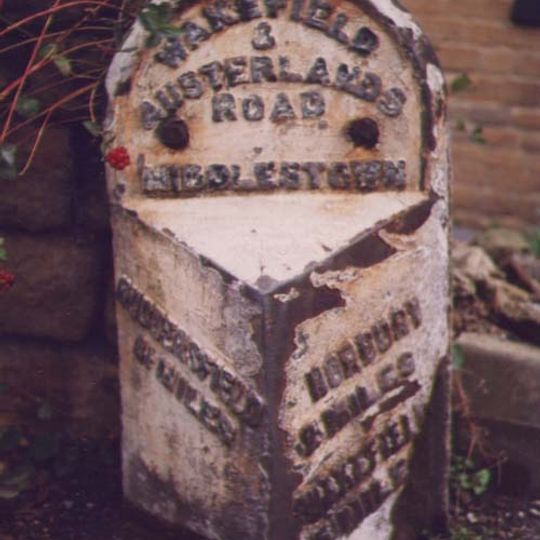 Milepost Adjacent To White Swan Public House