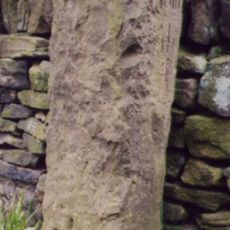 Milestone, Upper Cumberworth, S of A635 at jct of Carr Hill Road and Rowgate, beside white gable end