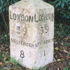 Milestone, Wendover Road; Bedgrove, by bus stop shelter, E of jct with Elm Farm Road