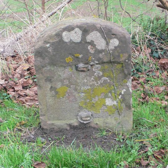 Milestone, 20m N from drive to Hill House Farm
