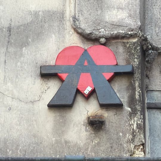 Un A qui deborde d'un coeur rouge