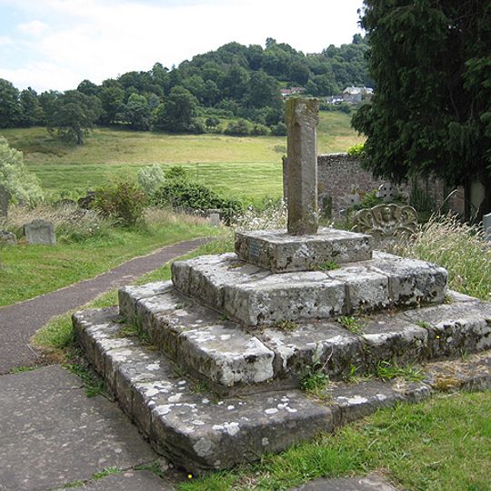 Base of churchyard cross with shaft approximately 2 metres south of south porch of Church of St Giles