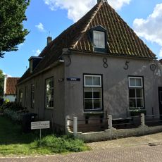 Karakteristiek Amelander huis onder zadeldak tussen topgevels