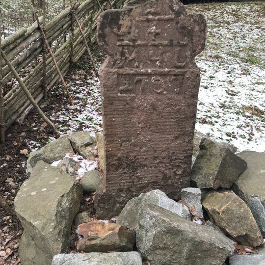 Kvartsmilstolpe i sten från 1737, Skansen
