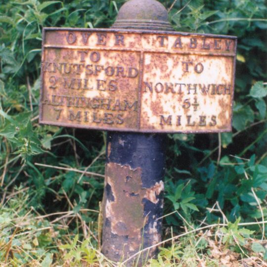 Milepost, S of Yewtree House, at jct with A5033