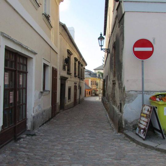 Pamětní deska s bustou Felixe Jeneweina v Barborské ulici v Kutné Hoře