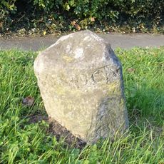 Milestone, centre of Effingham village, nr Scout Hall