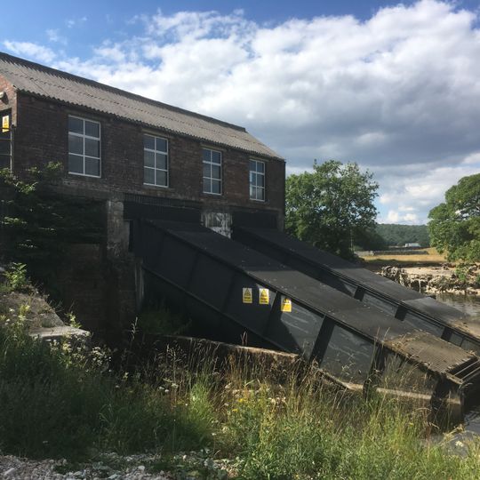 Hydro-electric power house and associated weir 250m north west of Tin Bridge