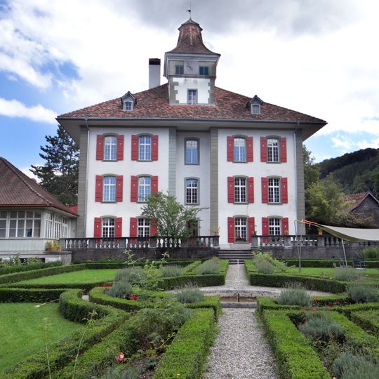 Chateau with former prison tower and garden pavilion