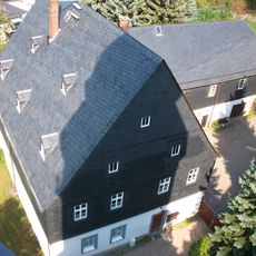 Pfarrhaus mit angebautem Seitengebäude Karlsbader Straße 69