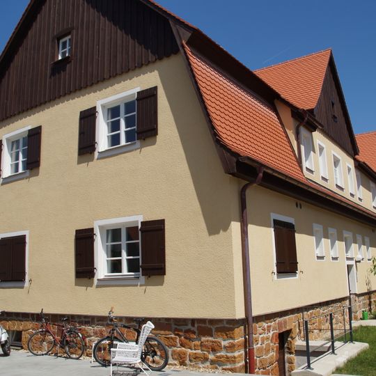 Mehrfamilienwohnhaus für die städtische Kleinsiedlung Schwabelweis