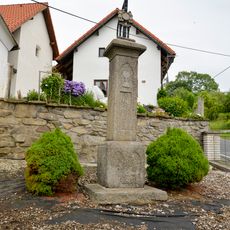 Cross by chapel in Kroměždice