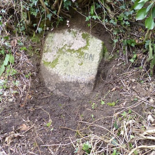 Milestone, just E of Lobhill Cross, 50m up from Lobhill Lodge