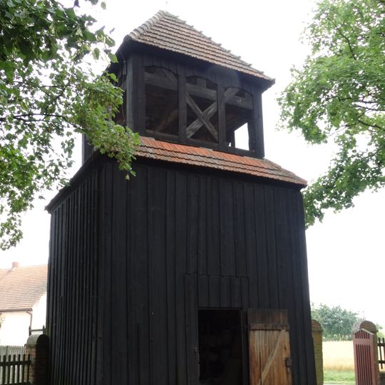 Wooden bell tower in Niestronno