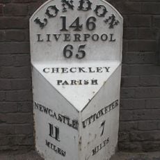 Milepost in front of 1 and 2 Hall Yard Buildings