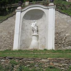 Socha Apollóna (západ)