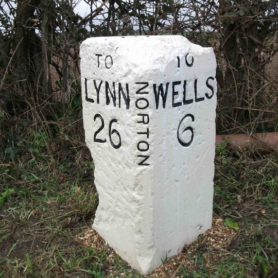 Milestone, 90yds E of jct with road to Burnham Norton