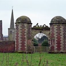 Gatehouse and attached courtyard walls at Hamstall Hall