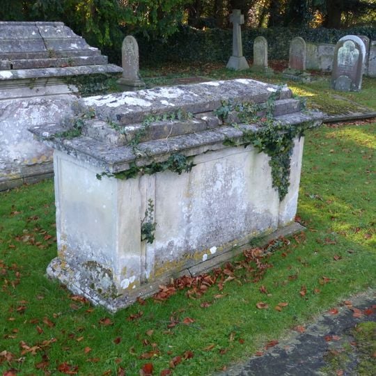 Group of 4 monuments in the churchyard approximately 15 metres south of tower to Church of St John the Baptist