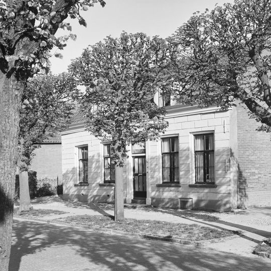 Huis van beganegrond met twee dakkapellen