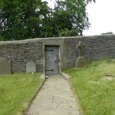 Door and surround in garden wall, Downham Hall, approximately 10 metres south west of church tower
