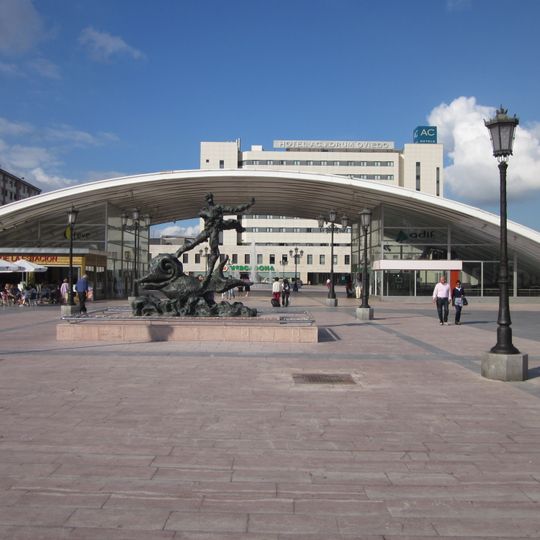 Hombre sobre delfín