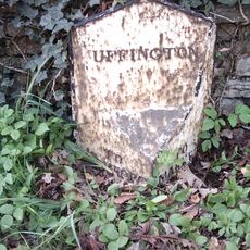 Milepost In Centre Of Village