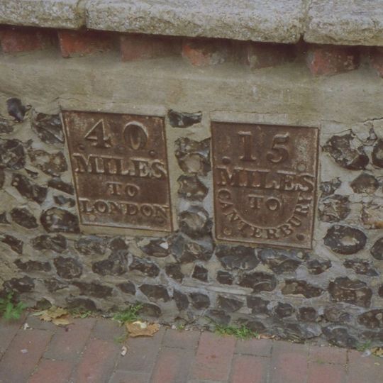 Milestone, High Street, SW corner of St Michael's Churchyard, in pedestrian zone