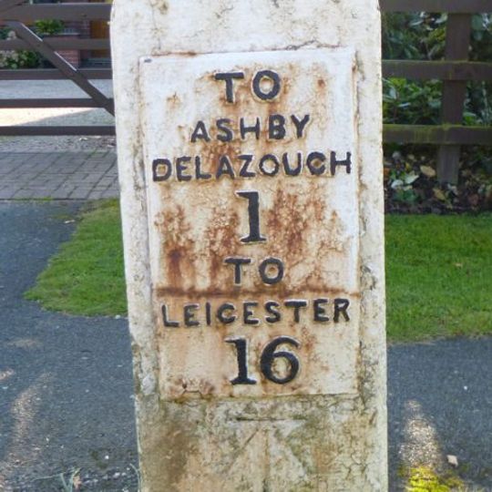 Milestone, Leicester Road, by No. 96