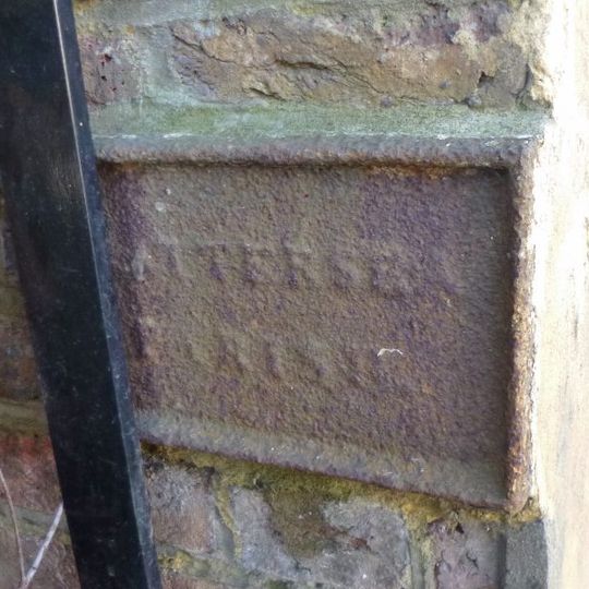 Boundary Wall Between Number 37 And Elf Filling Station Bearing Twin Plates