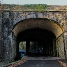 Railway Bridge over Graig-yr-Hesg Road, including integral stone drainage channel