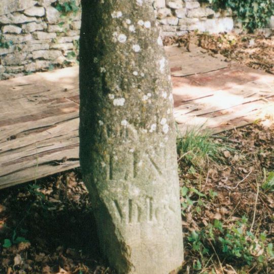 Milestone, by Church, on lane by Bletchingdon Park, in front of wall around church