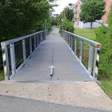 Lávka přes Litovický potok u Naardenské ulice