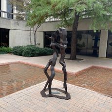 A sculpture that evokes the image of two people dancing