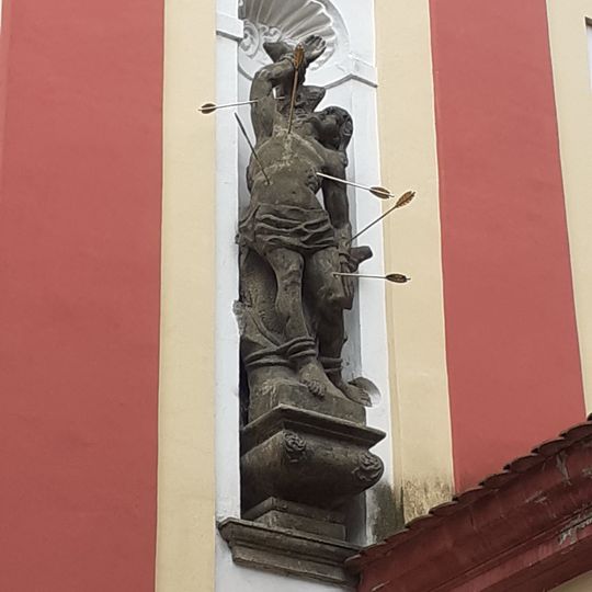 Socha svatého Šebestiána v levém předním výklenku kostela svatého Václava v Budyni nad Ohří