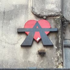 Un A qui deborde d'un coeur rouge