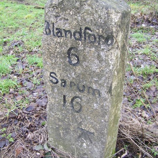 Milestone, SE of Chettle on main road; opp.  Plantation farm