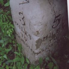 Milestone, Rochester Road, N of entrance to caravan site